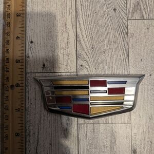 Cadillac Emblem with Red and Gold Accents